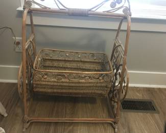 Vintage wicker doll cradle