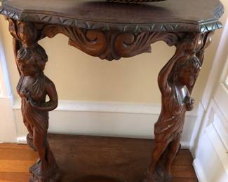 Antique figural carved table