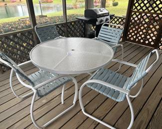 Tropitone table and 4 chairs