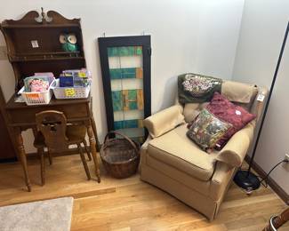 Armchair, stained glass window, small reading desk