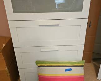 White furniture piece. Chest of drawers.