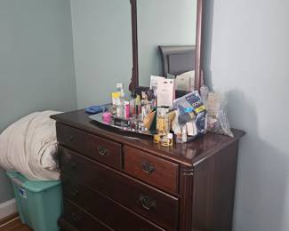 Antique dresser with mirror.