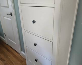 White chest of drawers.