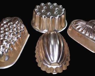 Four Copper Cake Molds 