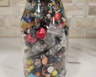 BOTTLE OF BLOWN GLASS BEADS AND MORE