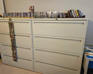 There are additional filing cabinets.
