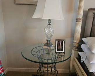Glass table and crystal lamp. Bed is not for sale.