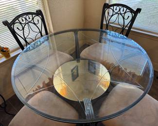 #23 - $220 -Kitchen glass  table round 48"/diam with 4 chairs - mirror shelve by legs 
