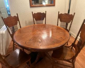 $350 - table & 6 chairs with leave. 