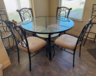 #23 - $220 -Kitchen glass  table round 48"/diam with 4 chairs - mirror shelve by legs 