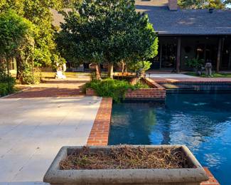 Cast concrete, very heavy. Professional movers required