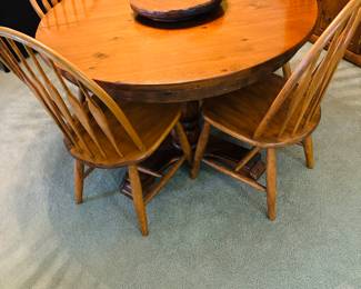 Nice table and chairs with a "Lazy Susan".  How did a lazy item become a kitchen classic?  And who is Susan anyway?