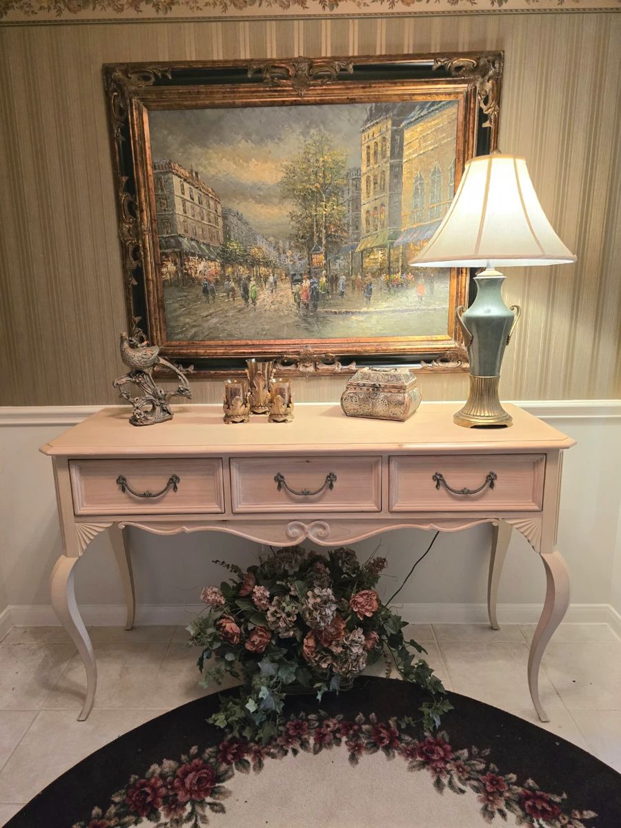 Beautiful wall painting and entry table (or couch table) plus misc lamps and home decor