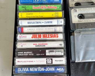 LOTS of cassette tapes, DVDs and VHS tapes, some never opened