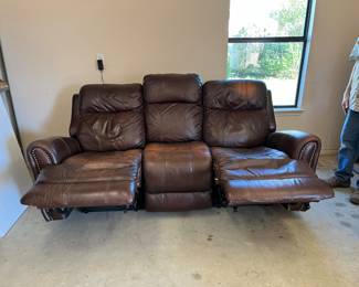 Brown leather motion sofa