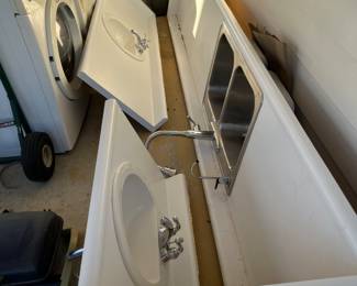 Kitchen and bath counters with sinks and faucets--the one with double sink sold.  Still have two bathroom vanity tops with sinks and faucets.