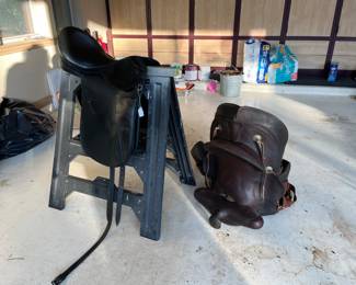 Vintage saddles:  c. 1990's dressage saddle and an uncle's cutting saddle, c. 1940's-50's.