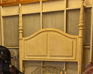 Lovely queen-size headboard with twisting, carved posts and a metal arch