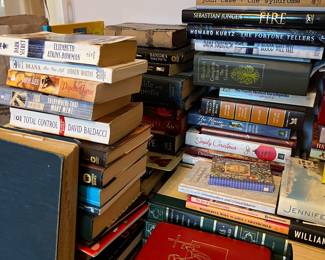 Several hardcover & paperback books 