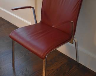 Pair of Ronals Schmitt red leather arm chairs