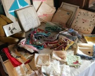 Vintage handkerchiefs & new entertaining sets with tablecloth + napkins. 
