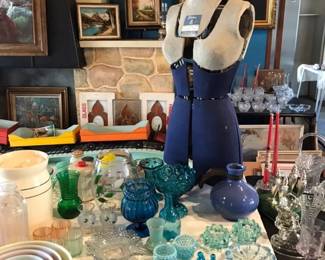 Vintage Dress Form surrounded by Beautiful Glass 