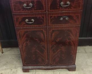 Figurative wood cabinet 