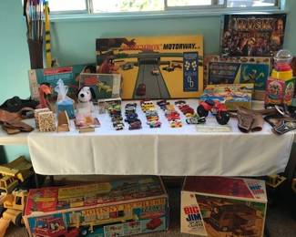 Lots of toys, mostly vintage -Matchbox, puzzles, games, child’s rocking chairs
