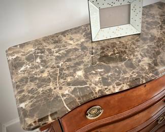 Pair of Stanley three-drawer bedside stands with marble tops