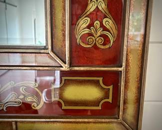 Red Italian-style mirror