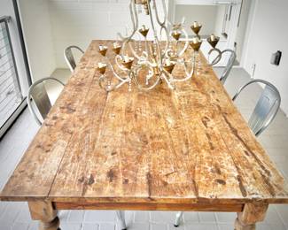 Pottery Barn dining table with four metal chairs