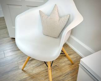 Eames-style white molded plastic chair