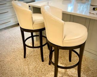 Two Pier 1 swivel bar stools