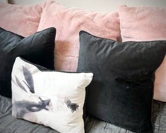 Daybed with trundle and pink/gray linens