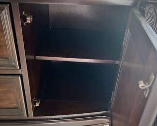 Dark wood sideboard with two cupboards and velvet-lined drawers