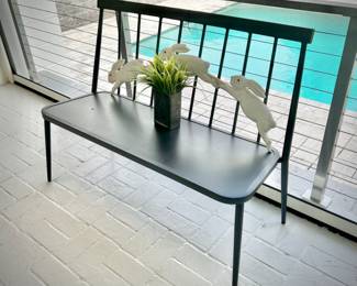 Second of two metal outdoor benches