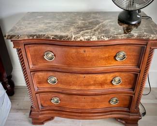Second of two Stanley three-drawer bedside stands with marble tops