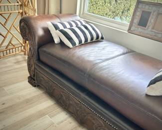Leather and carved wood chaise