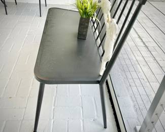 Second of two metal outdoor benches