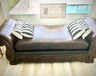Leather and carved wood chaise