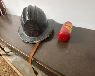 Vintage Fireman’s hat and fire exteenguisher