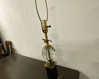 Black marble base with eagle over a clear sphere - great looking for traditional homes, mixed with antiques or in a black and white home.