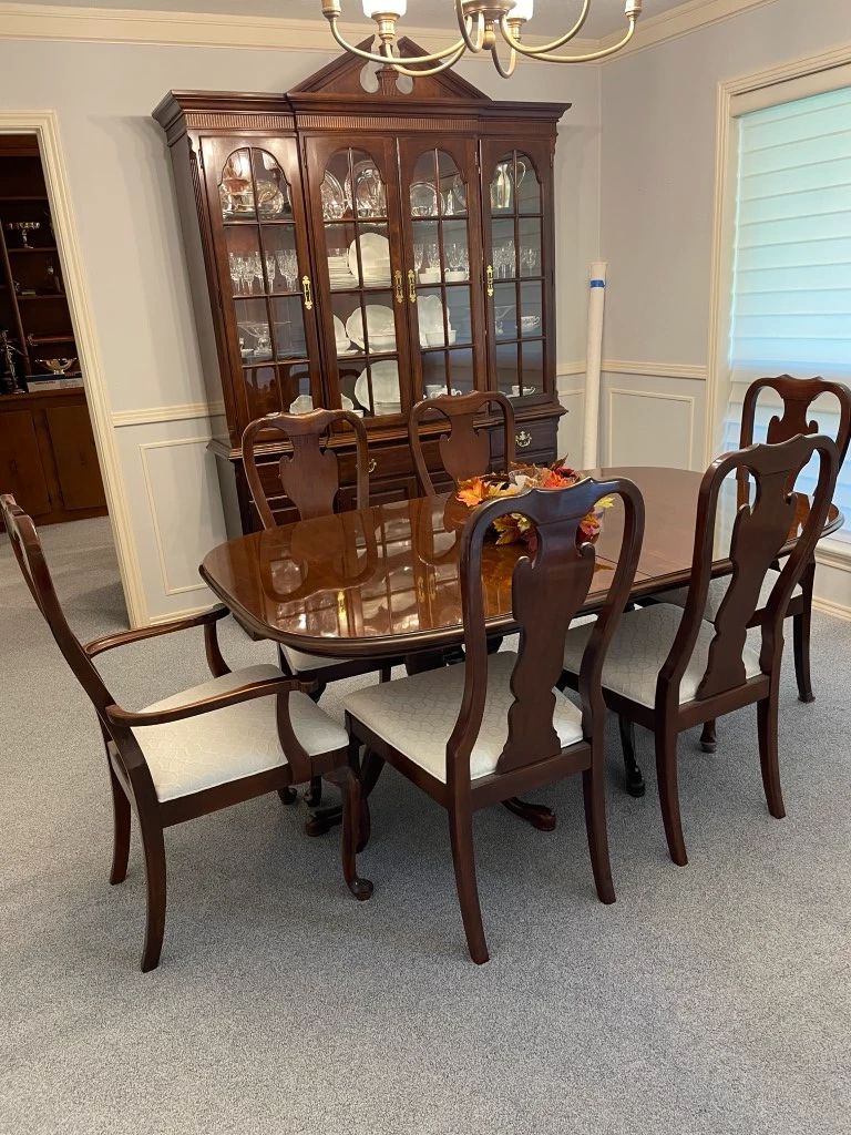 Drexel Dining Set and Hutch. Lighted Hutch is 90" h x 64" w x 15" deep. 3 drawers. 3 storage shelves. Immaculate. Needs one light bulb.