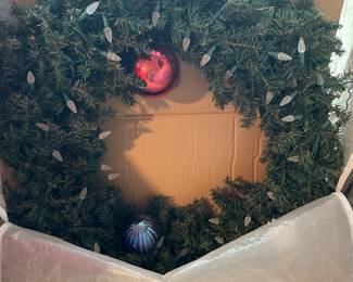 Two Outdoor Christmas Wreath just alike. Approx 28" across. Sold separately. Also, each comes with zippered storage bag.