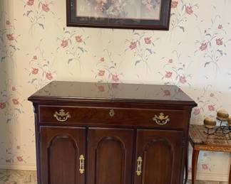 Drexel serving cart. Matches dining table and Buffet. 38 1/2" w x 19" d x 32" h. Top folds out on each side for serving.