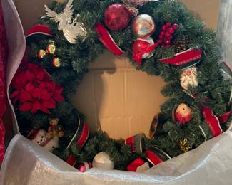 Outdoor Christmas Wreath. 28" Across. Comes with zippered storage bag.