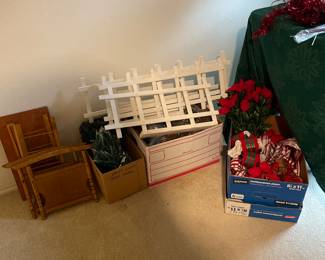Lights, Bows, White fence, small wooden cradle that needs to be assembled.