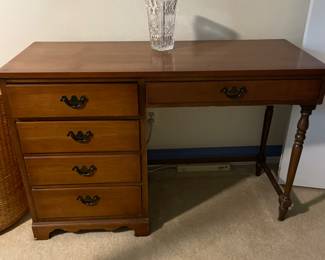 Student desk. 3 drawers on left. One drawer on right.