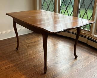Expandable Dining Table With Drop Leaf Sides
