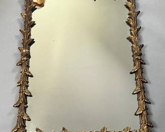 Carved And Gilt Floral And Foliate Decorated Wall Mirror
